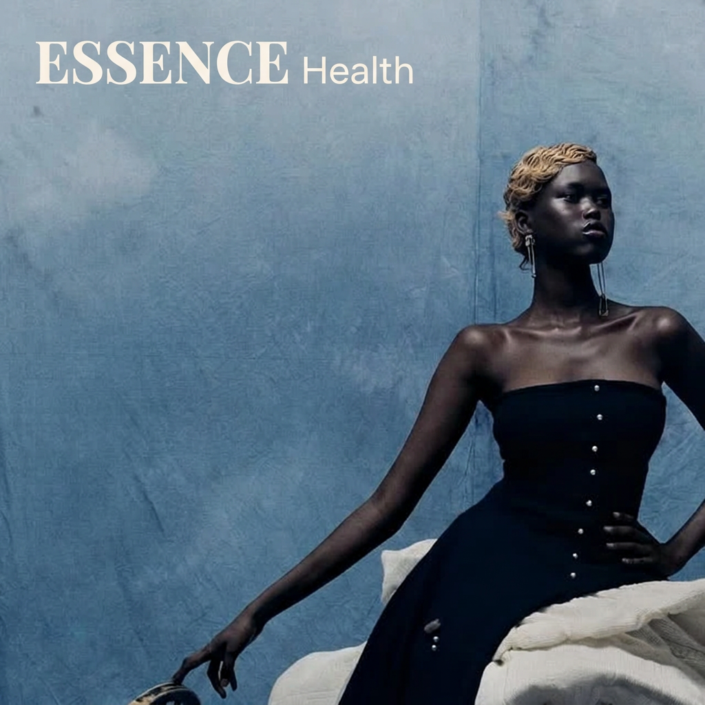 ESSENCE Health portrait of a seated woman in a black dress
